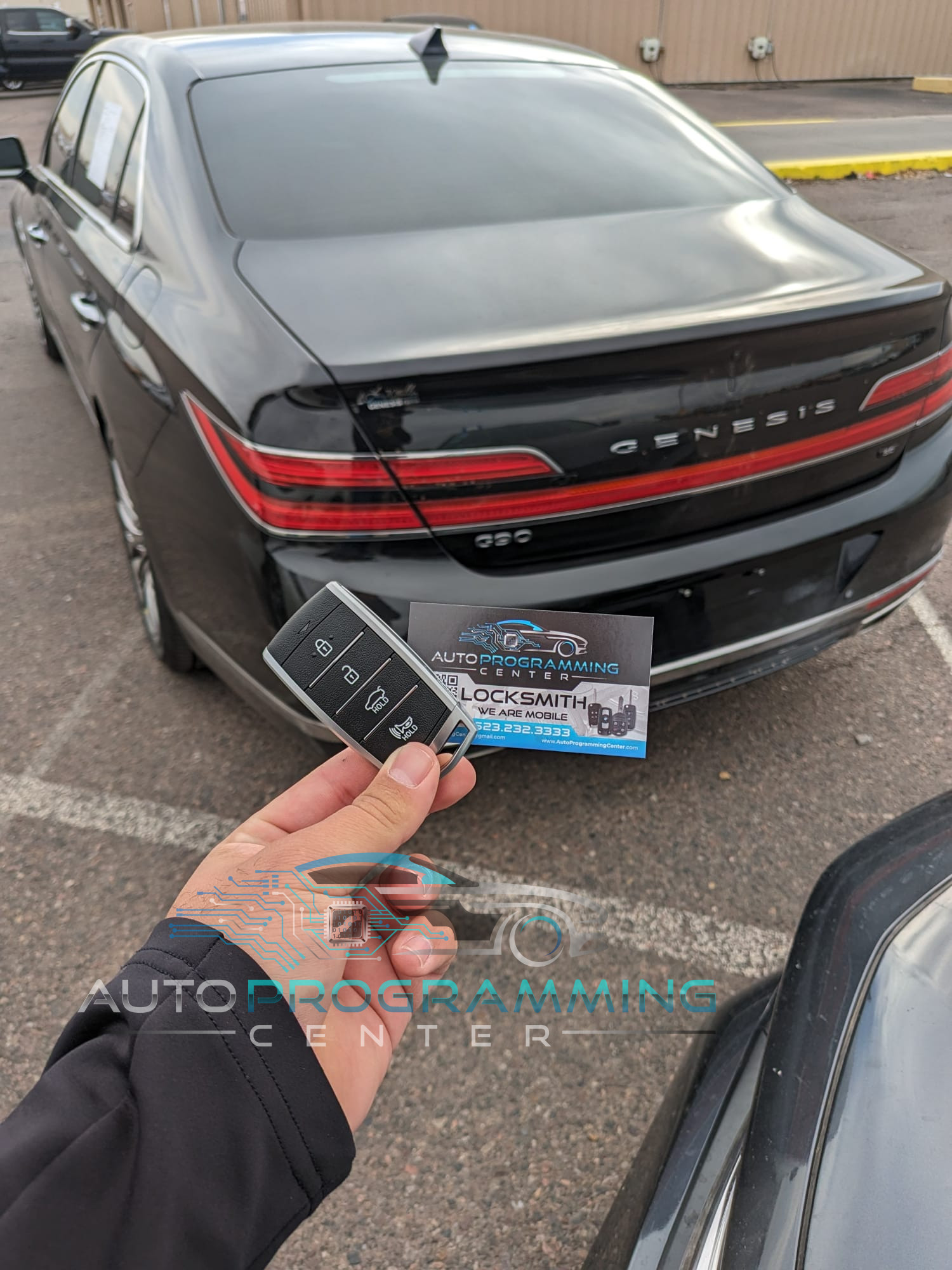 High-resolution image showcasing the sophisticated design and advanced features of a Genesis car key fob for effortless vehicle access and control.
